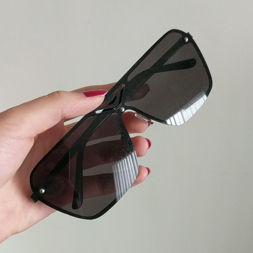 Black shield style sunglasses